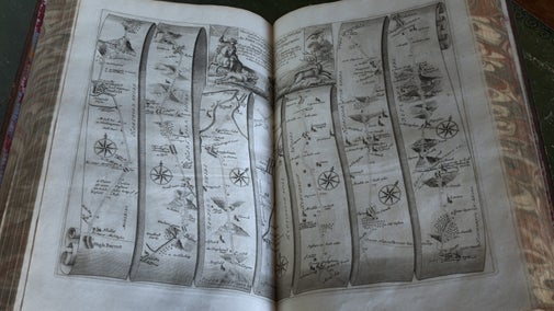 The atlas Britannia, published by John Ogilby in 1675, effectively the first road map of England, in the Library at Belton House, Lincolnshire.